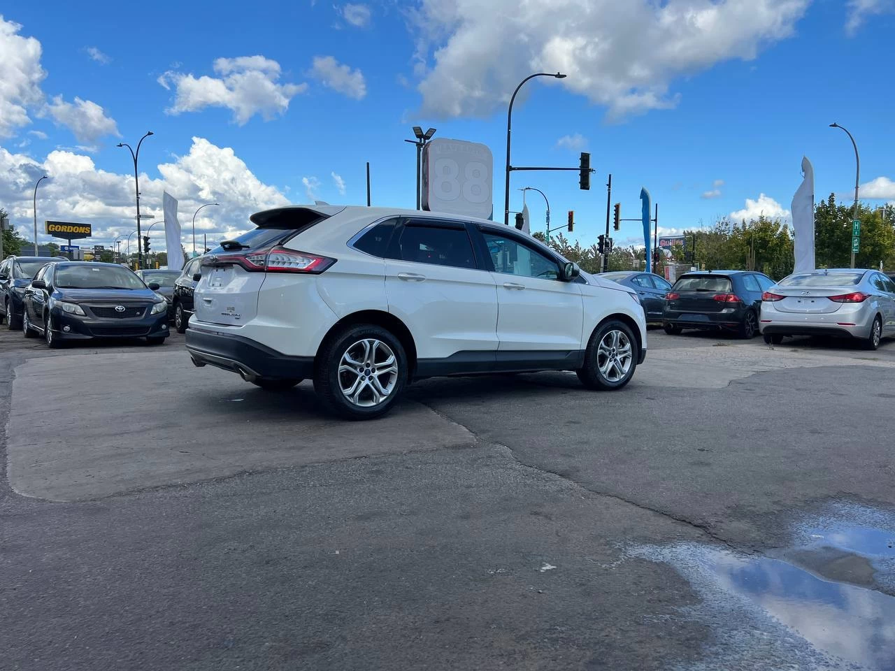2015 Ford Edge TitaniumT**AWD**Toit Ouvrant Panaromique**ANGLE MORT**CamÉra de Recul**SIEGES EN CUIR**Navigation**SIEGES CHAUFFANTS**SIEGES CHAUFFANTS ARRIERE**SiÈges ventilÉs**VOLANT CHAUFFANTS**MAGS**dÉmarrage À distance** Image principale