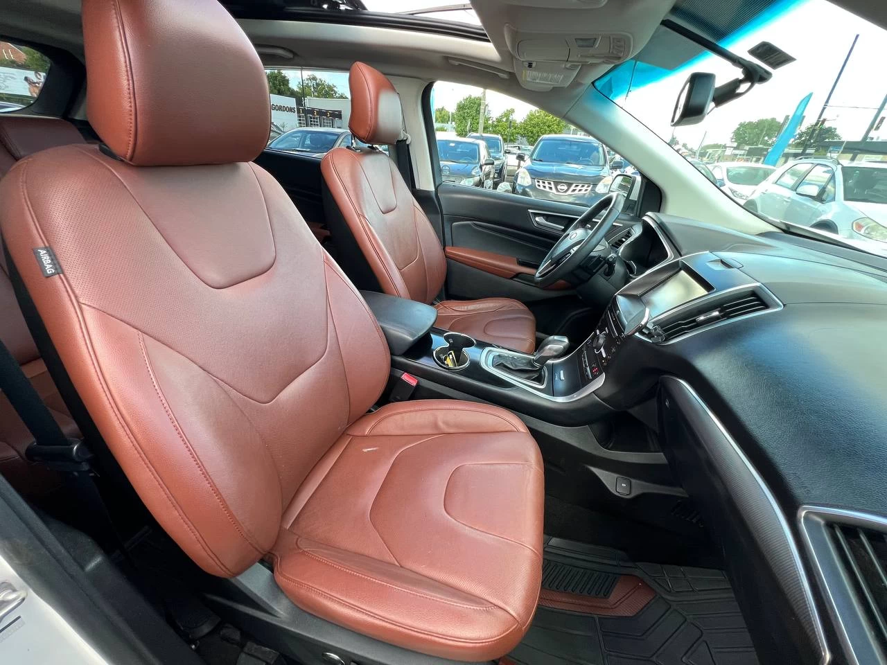 2015 Ford Edge TitaniumT**AWD**Toit Ouvrant Panaromique**ANGLE MORT**CamÉra de Recul**SIEGES EN CUIR**Navigation**SIEGES CHAUFFANTS**SIEGES CHAUFFANTS ARRIERE**SiÈges ventilÉs**VOLANT CHAUFFANTS**MAGS**dÉmarrage À distance** Image principale