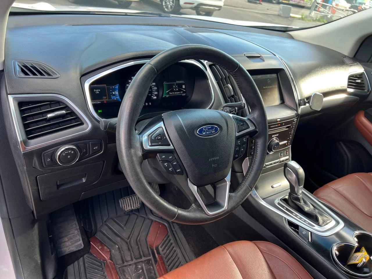 2015 Ford Edge TitaniumT**AWD**Toit Ouvrant Panaromique**ANGLE MORT**CamÉra de Recul**SIEGES EN CUIR**Navigation**SIEGES CHAUFFANTS**SIEGES CHAUFFANTS ARRIERE**SiÈges ventilÉs**VOLANT CHAUFFANTS**MAGS**dÉmarrage À distance** Image principale