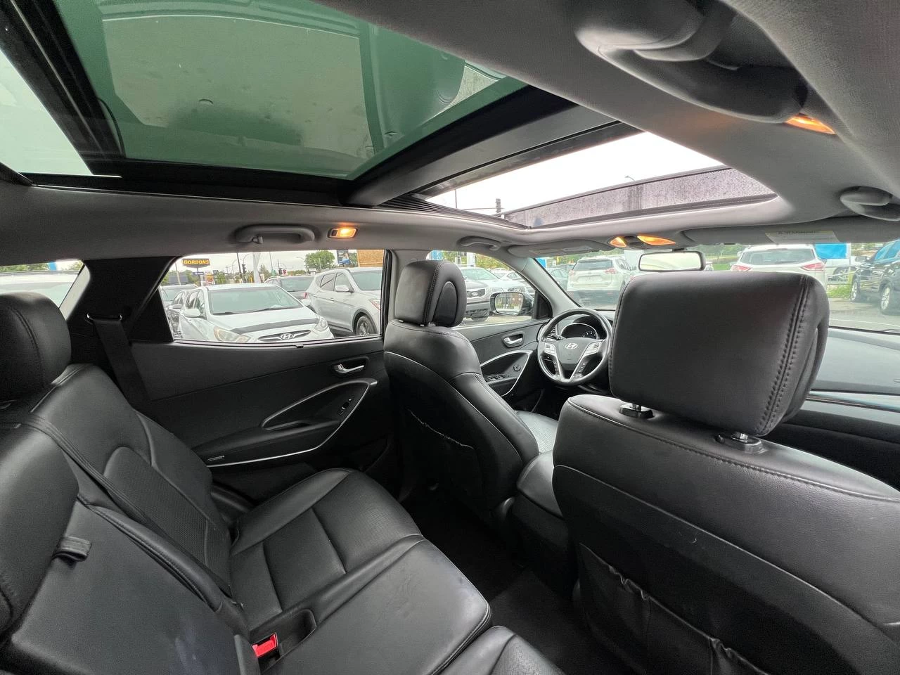 2014 Hyundai Santa Fe Sport SE**AWD**Jamais Accidente**TOIT OUVRANT PANORAMIQUE**SIEGE EN CUIR**CAMERA DE RECUL**SIEGES CHAUFFNATS AVANT ET ARRIERE**VOLANT CHAUFFNATS**MAGS** Image principale