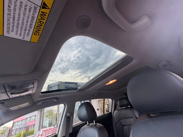 Kia Sportage EX**AWD**Jamais Accidentee**SAAQ Certifié**TOIT OUVRANT PANORAMIQUE**Navigation**SIEGE EN CUIR**CAMERA DE RECUL**SIEGES CHAUFFNATS**Siege Ventile**Mags** 2015