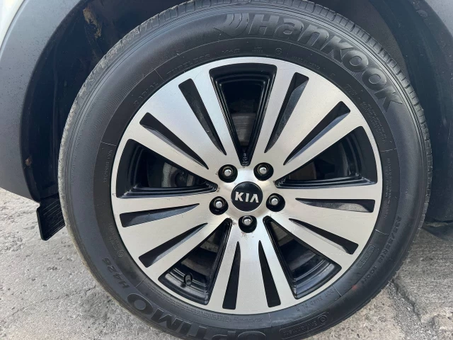 Kia Sportage EX**AWD**Jamais Accidentee**SAAQ Certifié**TOIT OUVRANT PANORAMIQUE**Navigation**SIEGE EN CUIR**CAMERA DE RECUL**SIEGES CHAUFFNATS**Siege Ventile**Mags** 2015