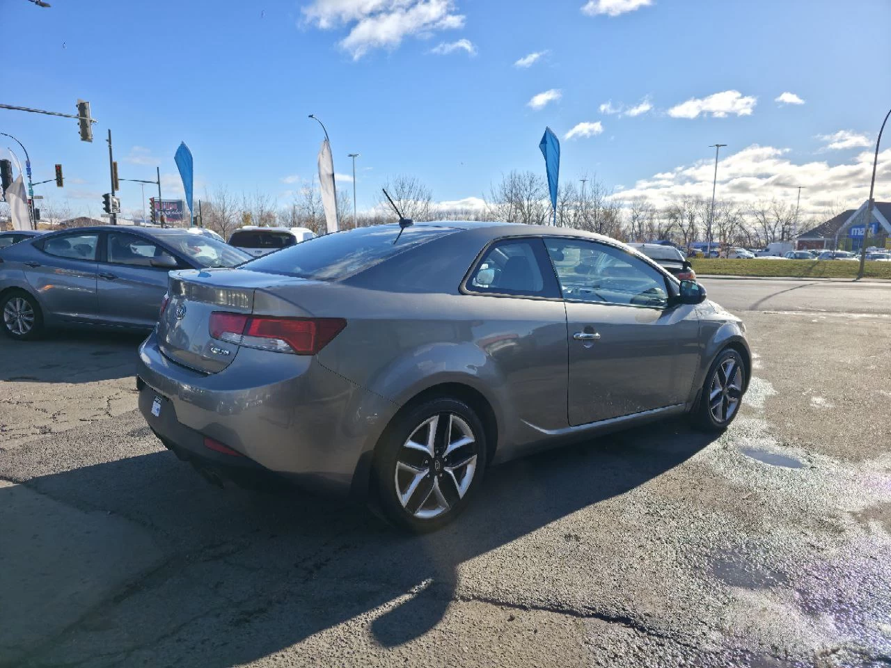 2011 Kia Forte Koup **SX**JAMAIS ACCIDENTEE**CUIR**TOIT OUVRANT**SIEGES CHAUFFANTS**MAGS**EN SPECIAL** Main Image