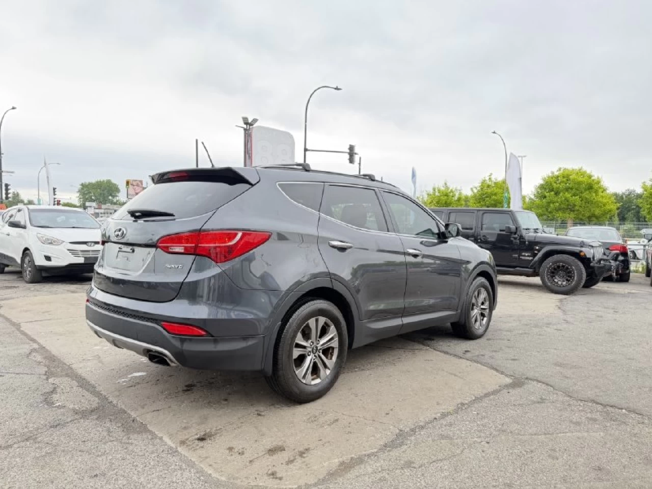 2016 Hyundai Santa Fe Sport JAMAIS ACCIDENTEE**SAAQ CERTIFIEE**UNE SEULE PROPRIO**2.4L**SIEGES CHAUFFANTS**MAGS**EN SPECIAL** Image principale