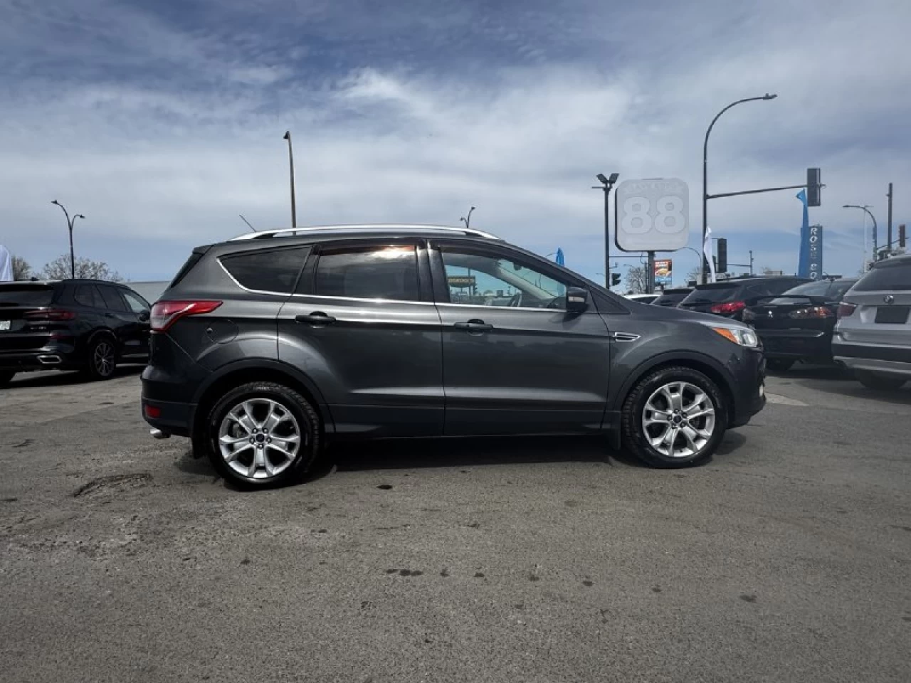 2015 Ford Escape Titanium**AWD**Toit Ouvrant**CamÉra de Recul**SIEGES EN CUIR**Navigation**SIEGES CHAUFFANTS**MAGS** Image principale