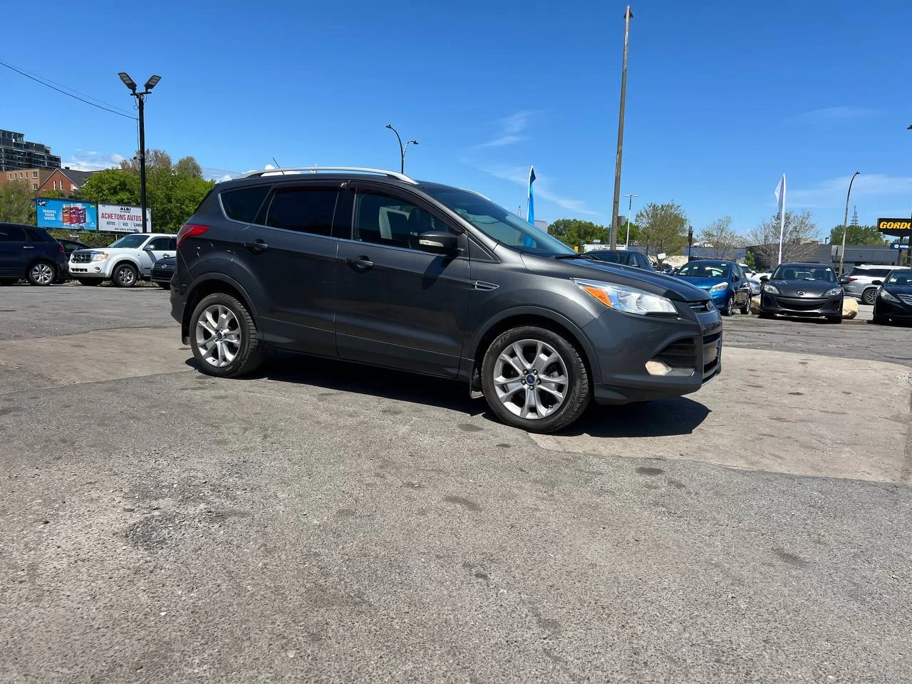 2015 Ford Escape Titanium**AWD** Jamais accidente**Toit Ouvrant**CamÉra de Recul**SIEGES EN CUIR**Navigation**SIEGES CHAUFFANTS**dÉmarrage À distance**MAGS** Image principale