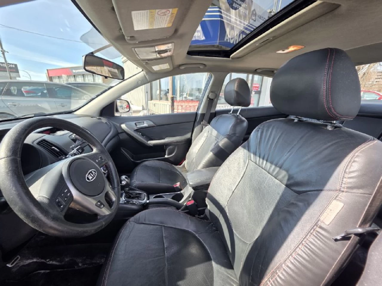 2011 Kia Forte **SX**JAMAIS ACCIDENTEE**CUIR**TOIT OUVRANT**SIEGES CHAUFFANTS**EN SPECIAL Image principale