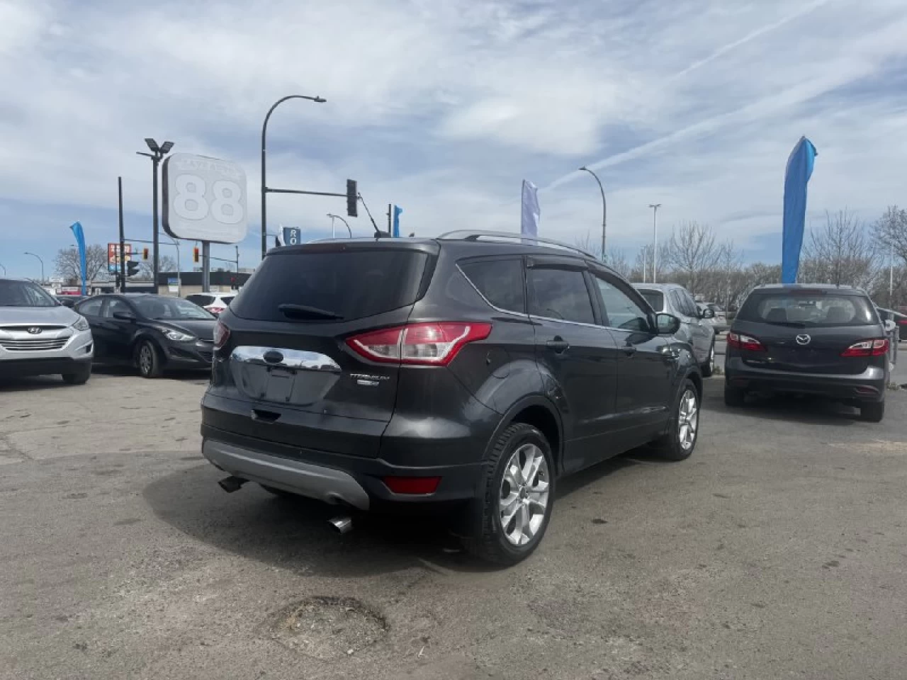 2015 Ford Escape Titanium**AWD**Toit Ouvrant**CamÉra de Recul**SIEGES EN CUIR**Navigation**SIEGES CHAUFFANTS**MAGS** Image principale