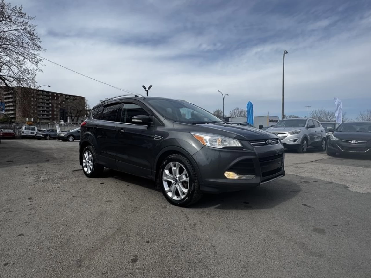 2015 Ford Escape Titanium**AWD**Toit Ouvrant**CamÉra de Recul**SIEGES EN CUIR**Navigation**SIEGES CHAUFFANTS**MAGS** Image principale