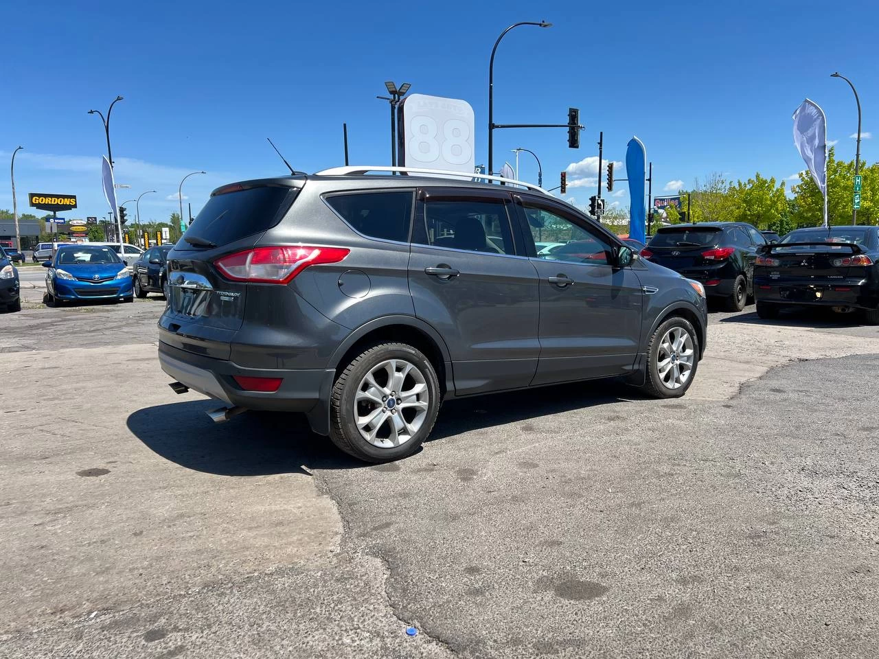 2015 Ford Escape Titanium**AWD** Jamais accidente**Toit Ouvrant**CamÉra de Recul**SIEGES EN CUIR**Navigation**SIEGES CHAUFFANTS**dÉmarrage À distance**MAGS** Image principale