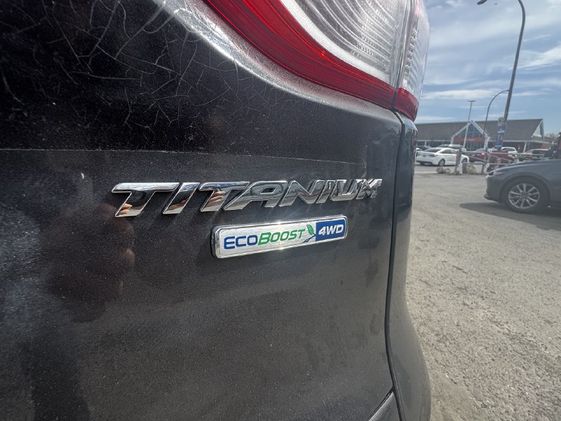 2015 Ford Escape Titanium**AWD**Toit Ouvrant**CamÉra de Recul**SIEGES EN CUIR**Navigation**SIEGES CHAUFFANTS**MAGS** Image principale