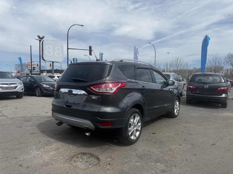 2015 Ford Escape Titanium**AWD**Toit Ouvrant**CamÉra de Recul**SIEGES EN CUIR**Navigation**SIEGES CHAUFFANTS**MAGS** Image principale