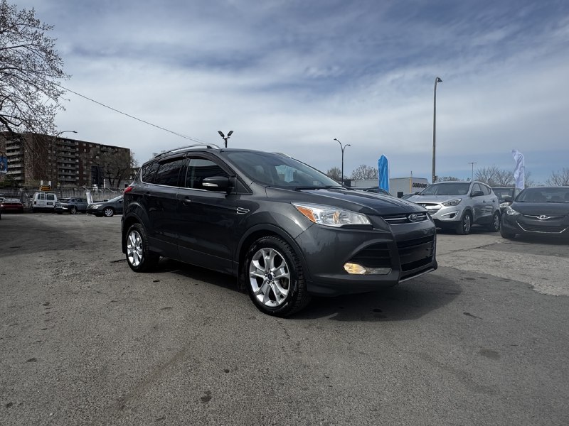 2015 Ford Escape Titanium**AWD**Toit Ouvrant**CamÉra de Recul**SIEGES EN CUIR**Navigation**SIEGES CHAUFFANTS**MAGS** Image principale
