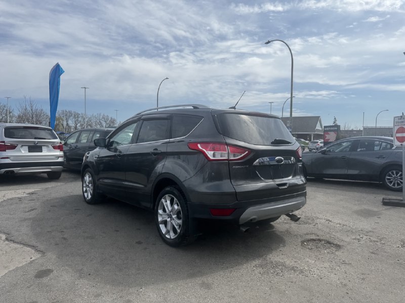2015 Ford Escape Titanium**AWD**Toit Ouvrant**CamÉra de Recul**SIEGES EN CUIR**Navigation**SIEGES CHAUFFANTS**MAGS** Image principale
