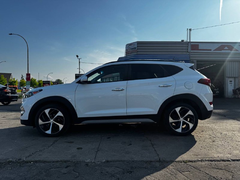 2017 Hyundai Tucson SE**AWD**Jamais accidente**Un PropriÉtaire**CUIR**TOIT PANORAMIQUE**VOLANT CHAUFFNATS**SIEGES CHAUFFANTS**MAGS**CAMERA DE RECULE** Image principale