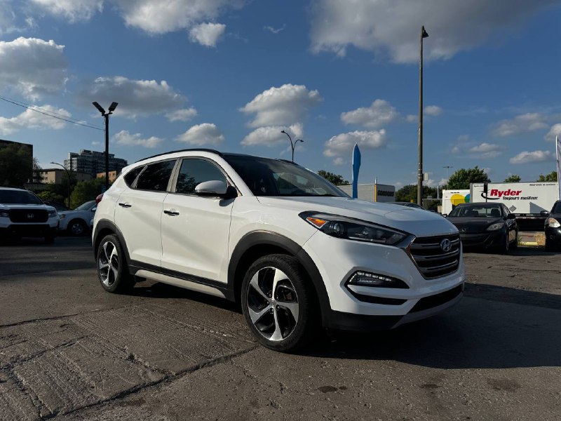 2017 Hyundai Tucson SE**AWD**Jamais accidente**Un PropriÉtaire**CUIR**TOIT PANORAMIQUE**VOLANT CHAUFFNATS**SIEGES CHAUFFANTS**MAGS**CAMERA DE RECULE** Image principale