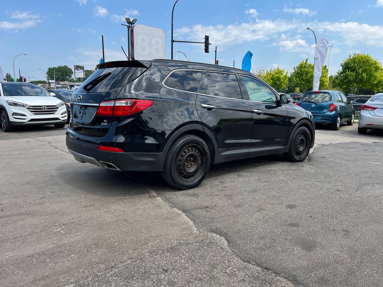 2016 Hyundai Santa Fe XL Luxury**6 PASSAGERS**AWD**Toit Ouvrant**CamÉra de Recul**SIEGES EN CUIR**Volant Chauffant**SIEGES CHAUFFANTS** Image principale