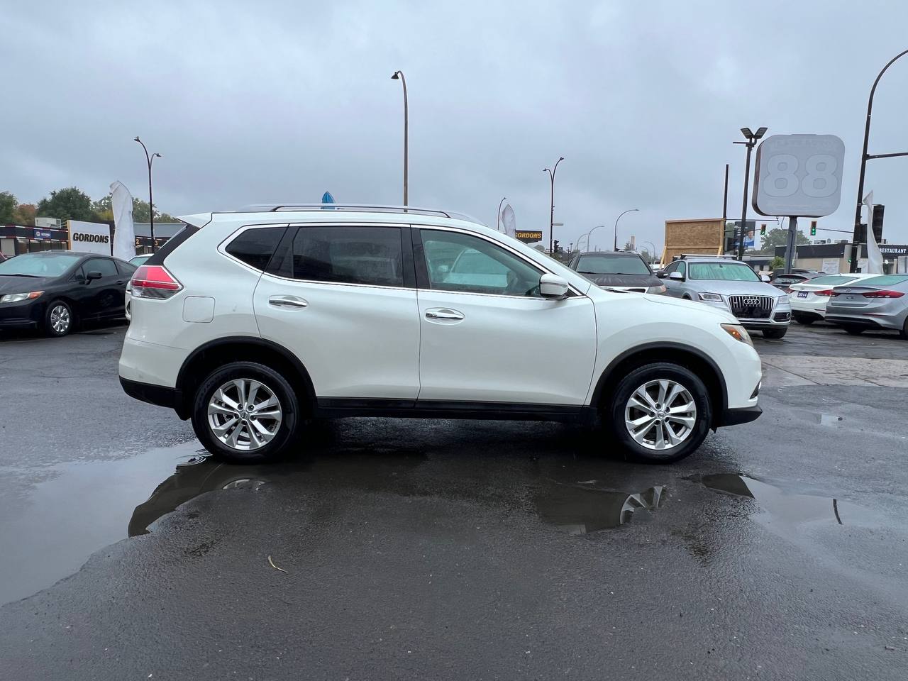 2015 Nissan Rogue SV**AWD**SAAQ CERTIFIEE**Un Proprietaire**TOIT OUVRANT PANORAMIQUE**CAMERA DE RECULE**SIEGES CHAUFFNATS**Mags** Image principale