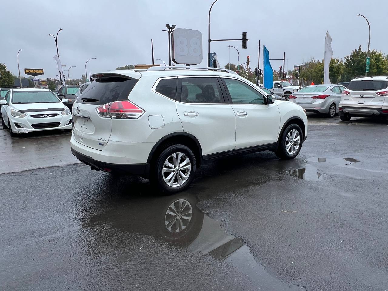 2015 Nissan Rogue SV**AWD**SAAQ CERTIFIEE**Un Proprietaire**TOIT OUVRANT PANORAMIQUE**CAMERA DE RECULE**SIEGES CHAUFFNATS**Mags** Image principale