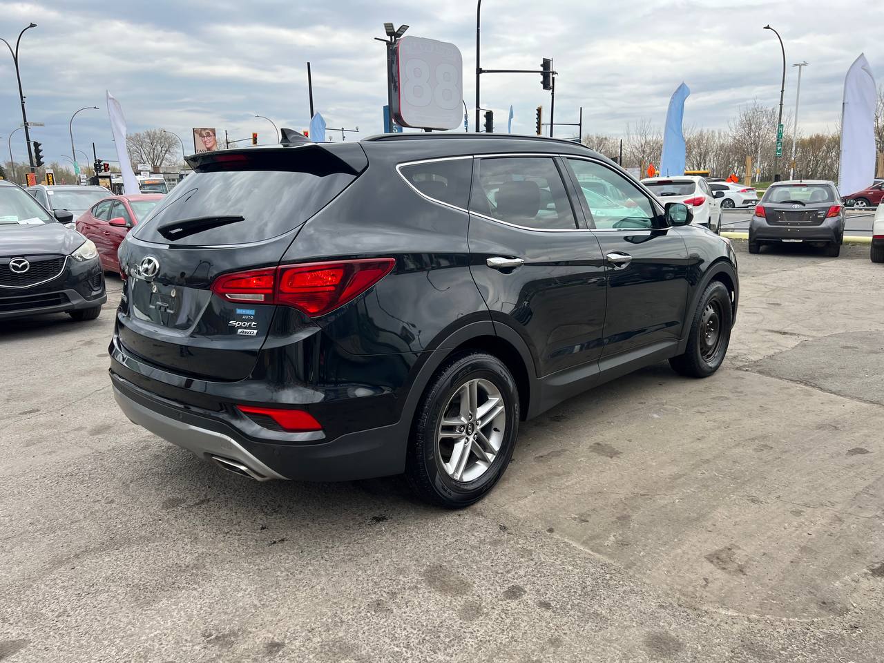 2017 Hyundai Santa Fe Sport SE**AWD**TOIT OUVRANT PANORAMIQUE**SIEGE EN CUIR**CAMERA DE RECUL**SIEGES CHAUFFNATS AVANT ET ARRIERE**Volant Chauffant**Alerte d'angle Mort**MAGS** Image principale